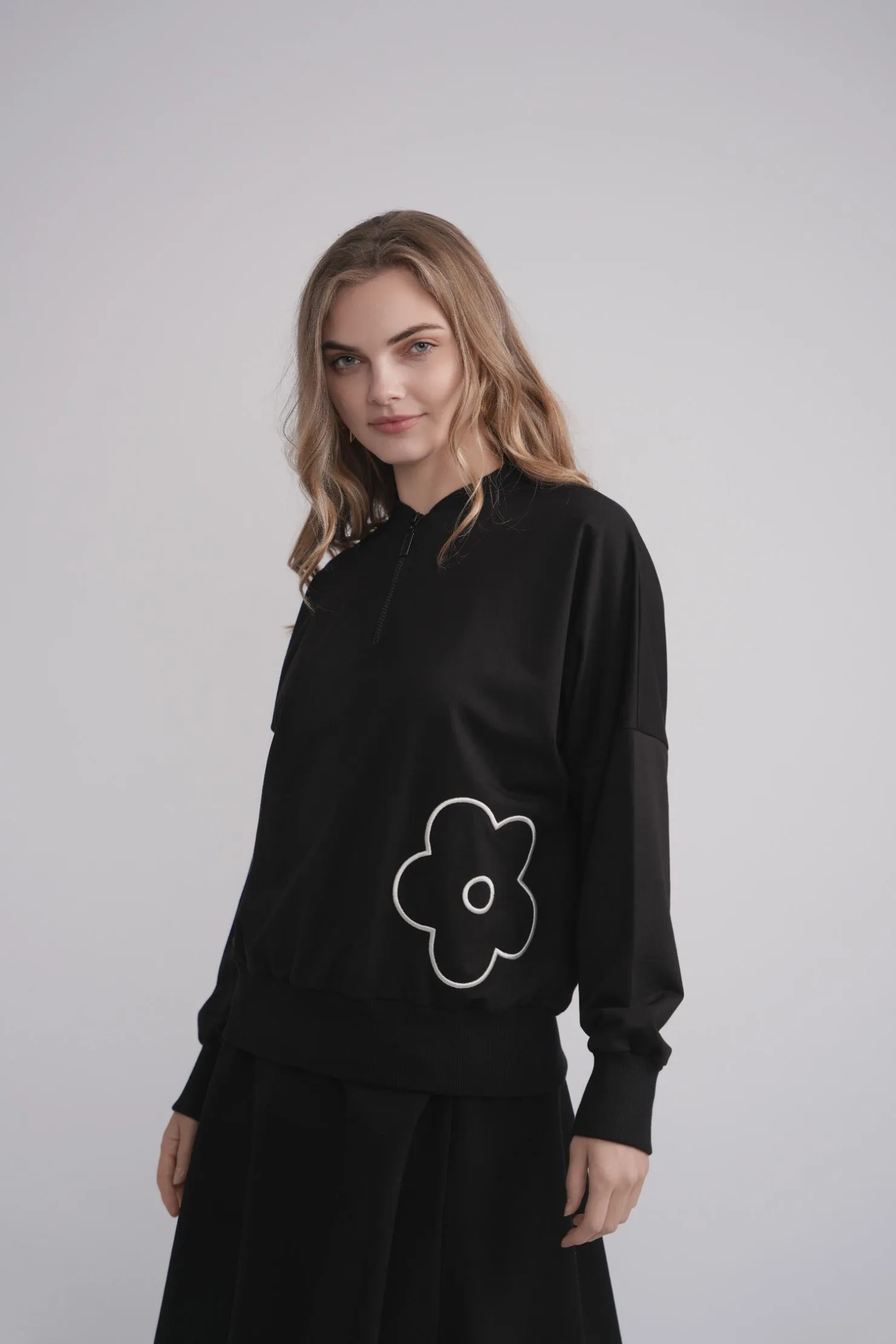 Embroidered Flower Half Zip Sweatshirt sold by Zulily