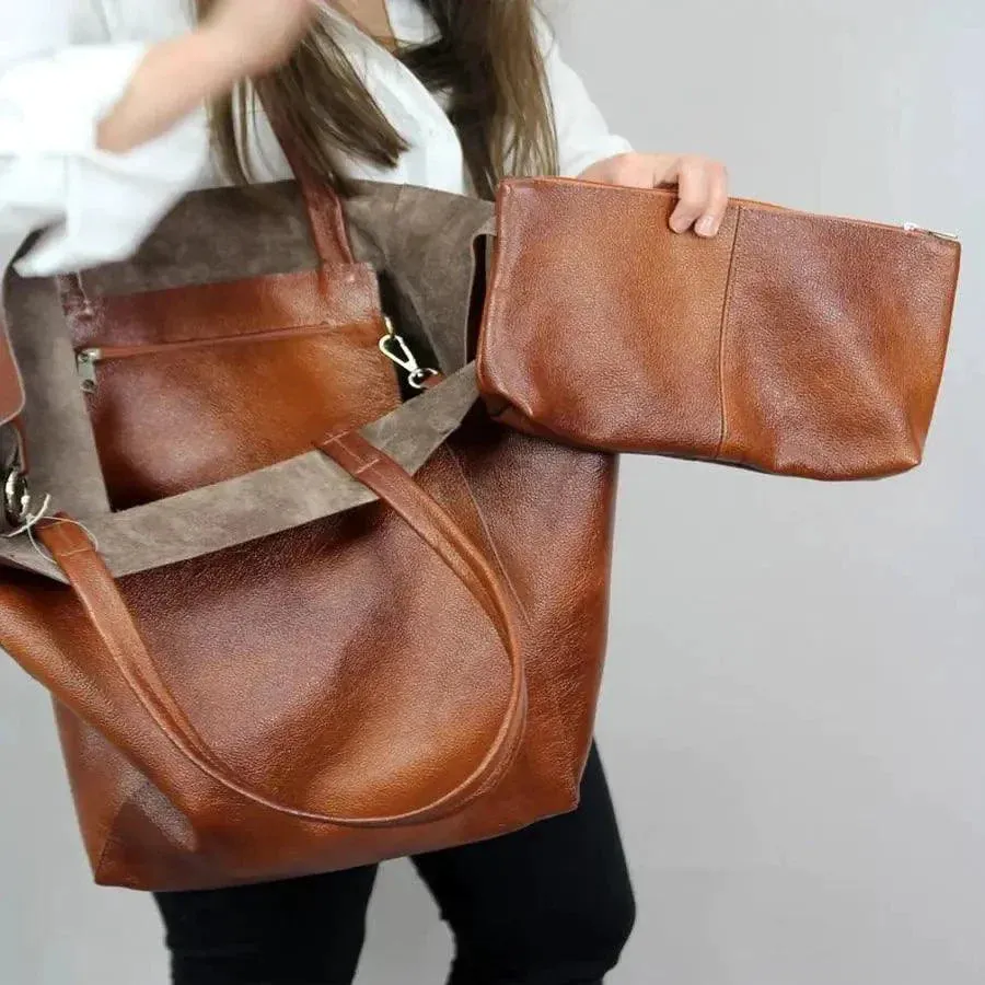 Chic Leather Tote Handbags sold by Zulily