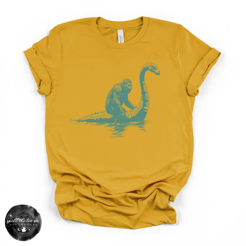 Bigfoot Riding Nessy Tee | Funny Cryptid Graphic T-Shirt made by Zulily