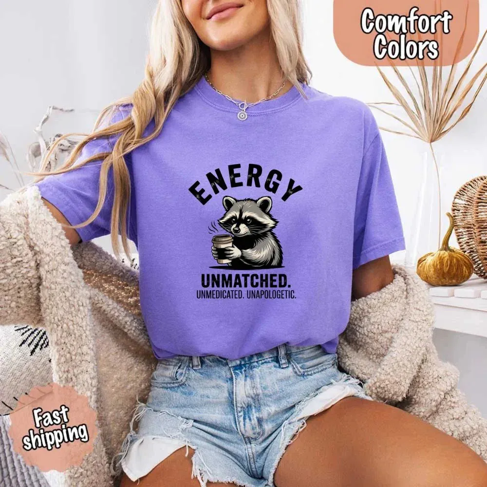 Comfort Colors Energy Unmatched Raccoon Coffee Funny T-Shirt sold by Zulily
