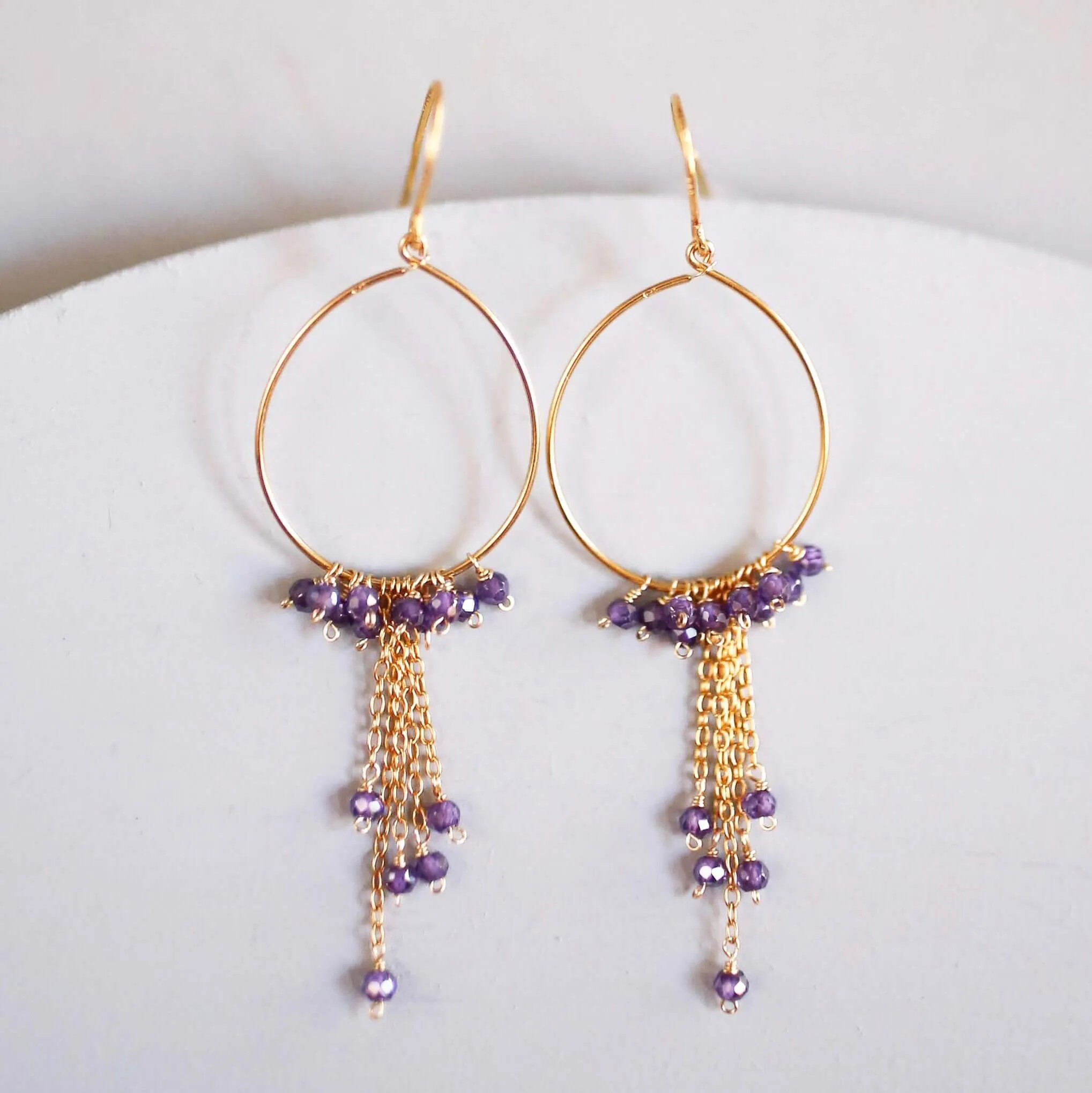 Amethyst Gold Mini Swing Hoop Earrings sold by Zulily