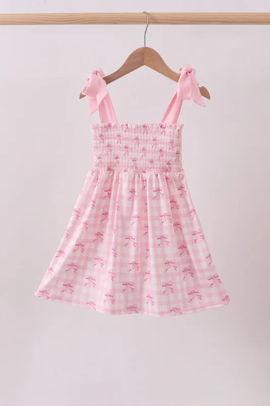 Pink bow smocked ruffle dress made by Zulily