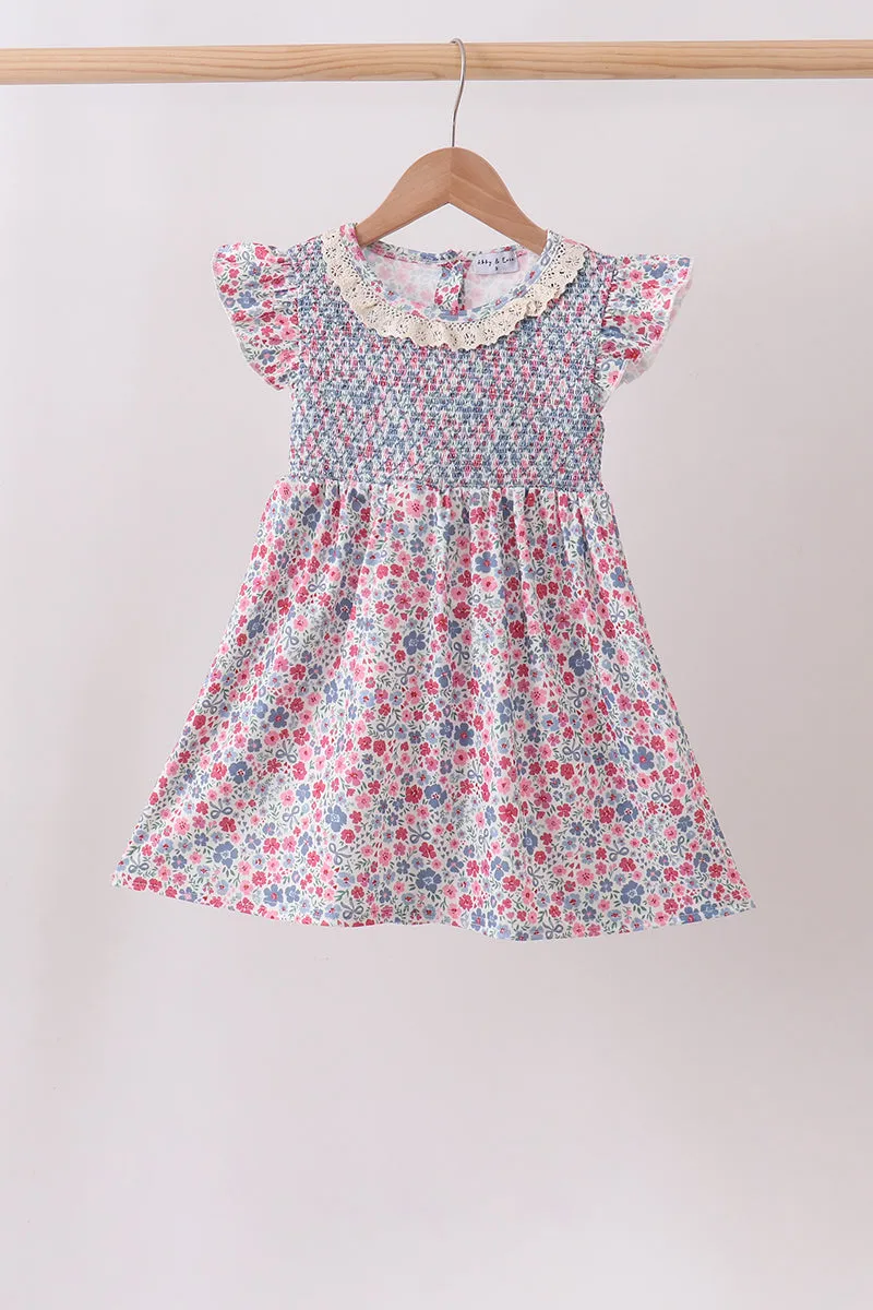 Blue Floral Smocked Ruffle Dress sold by Zulily