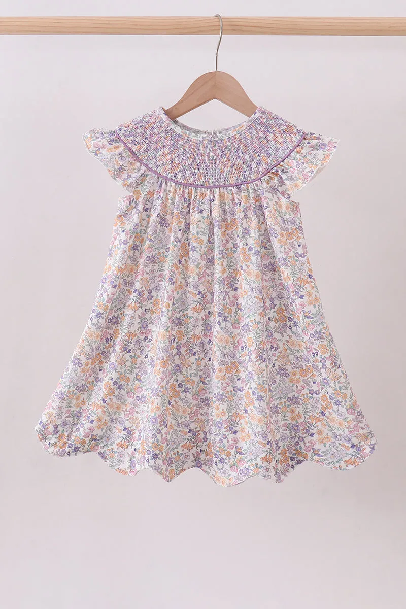 Purple Floral Smocked Dress sold by Zulily