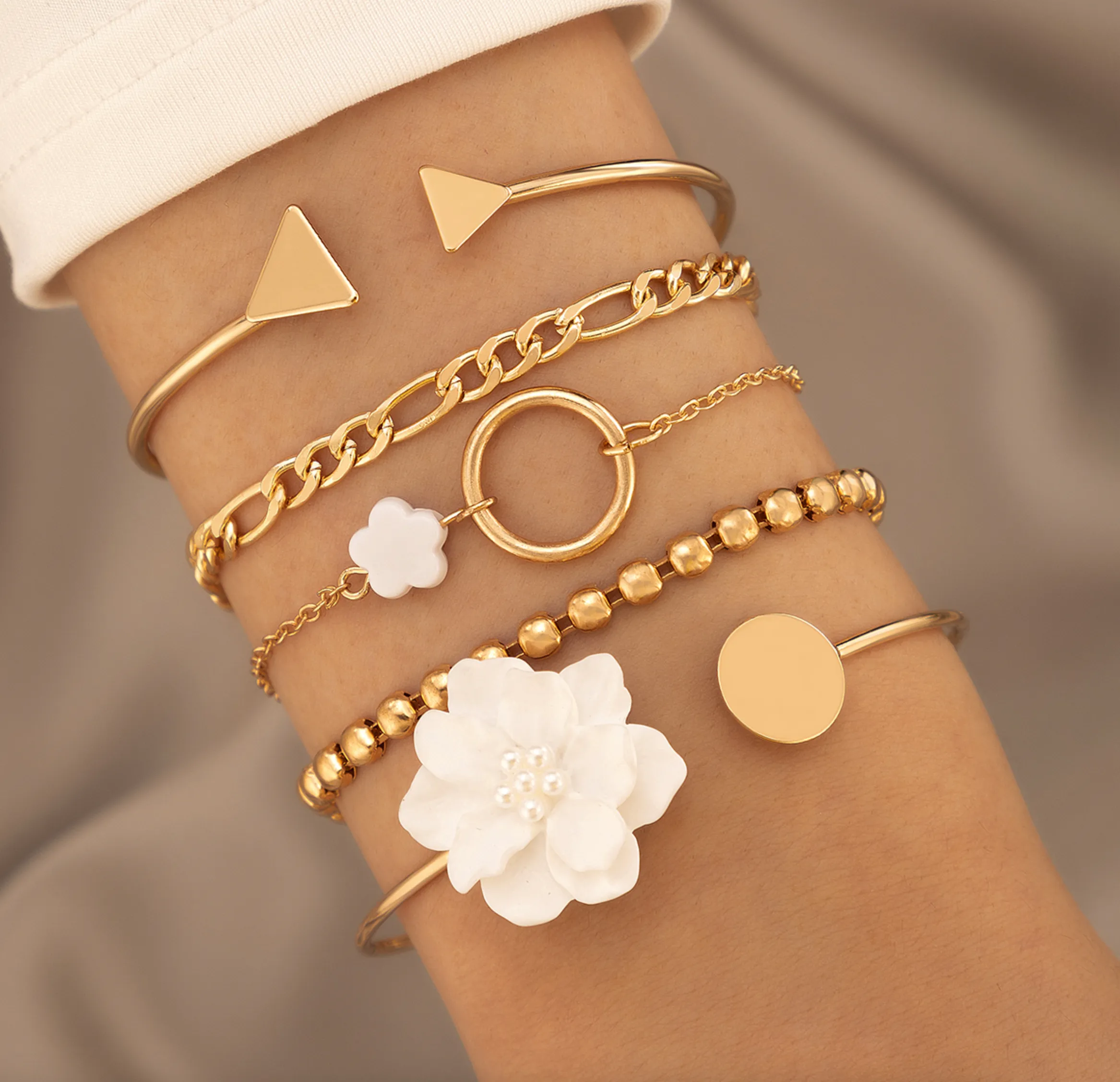 Goldtone White Floral Chain Bracelet Set sold by Zulily