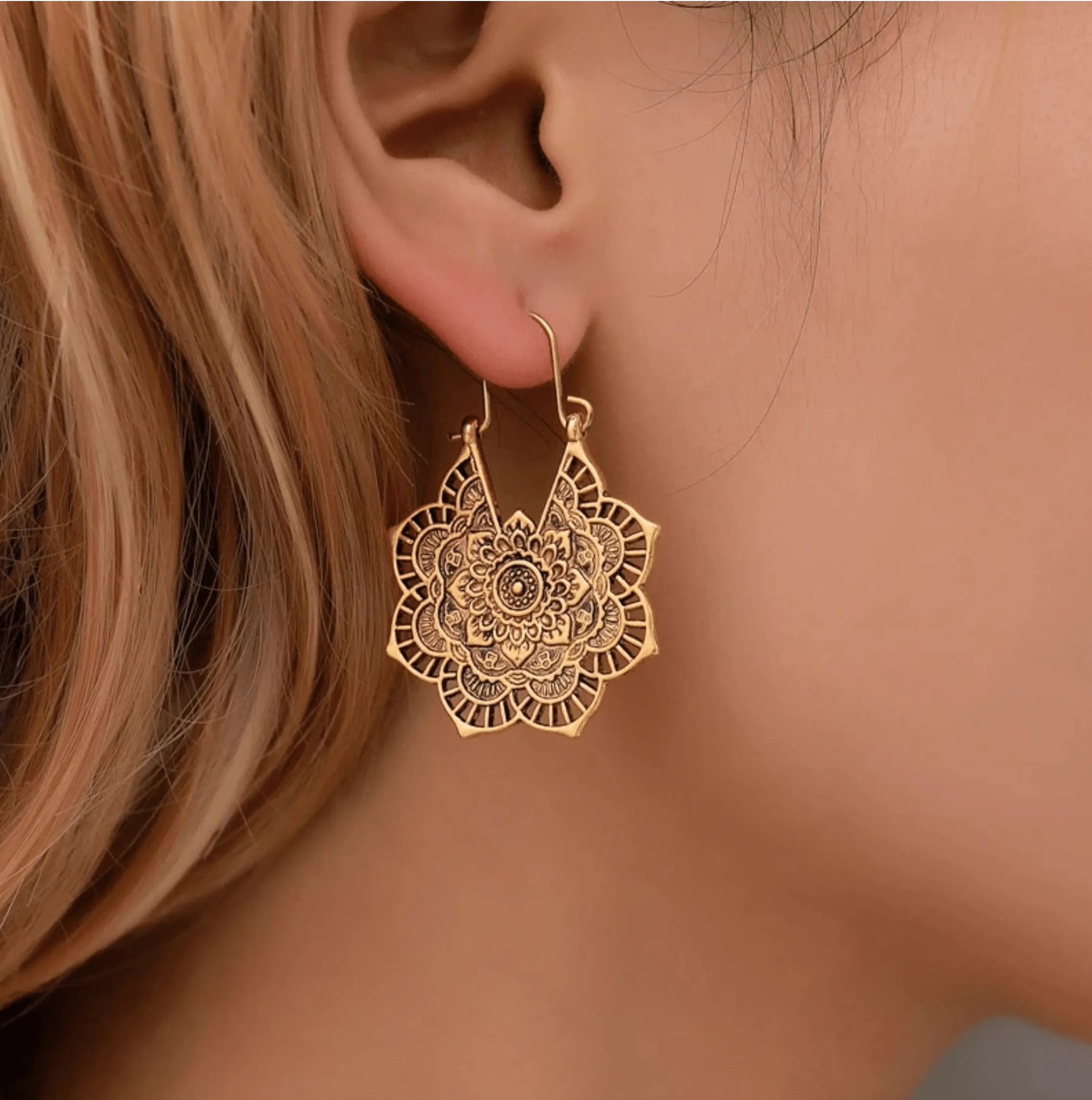 Goldtone Mandala Drop Earrings sold by Zulily