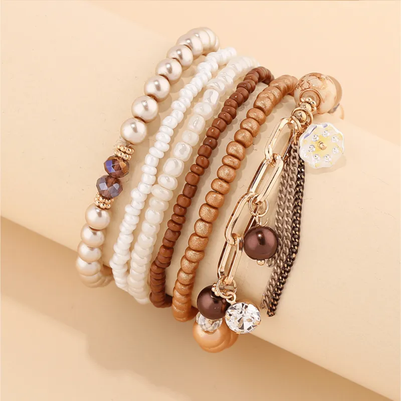 Bronze Metallic White Beaded Bracelet Set made by Zulily