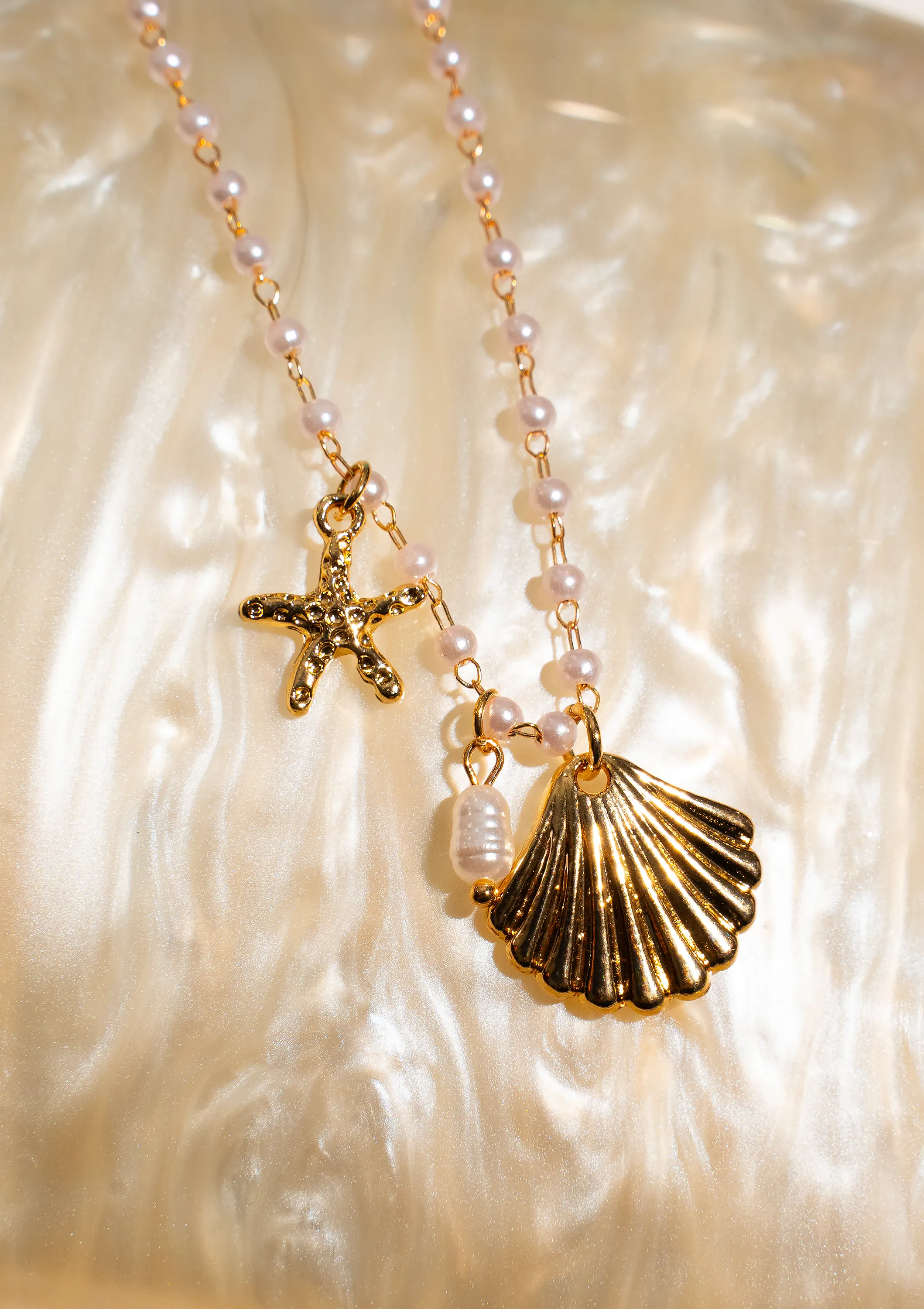 SEASHELL Charm Necklace sold by Zulily