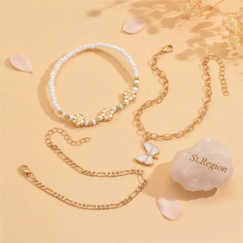White Enamel & Howlite Goldtone Flower Beads Butterfly Charm Anklet Set made by Zulily