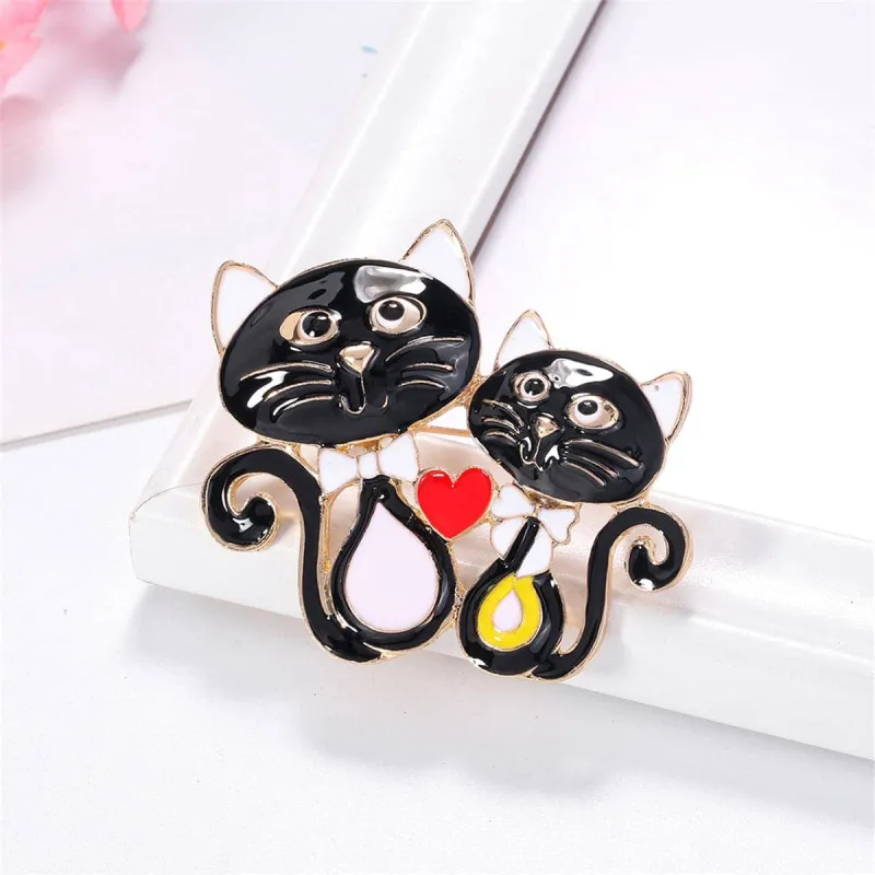 Black Enamel & Goldtone Double-Cat Brooch made by Zulily