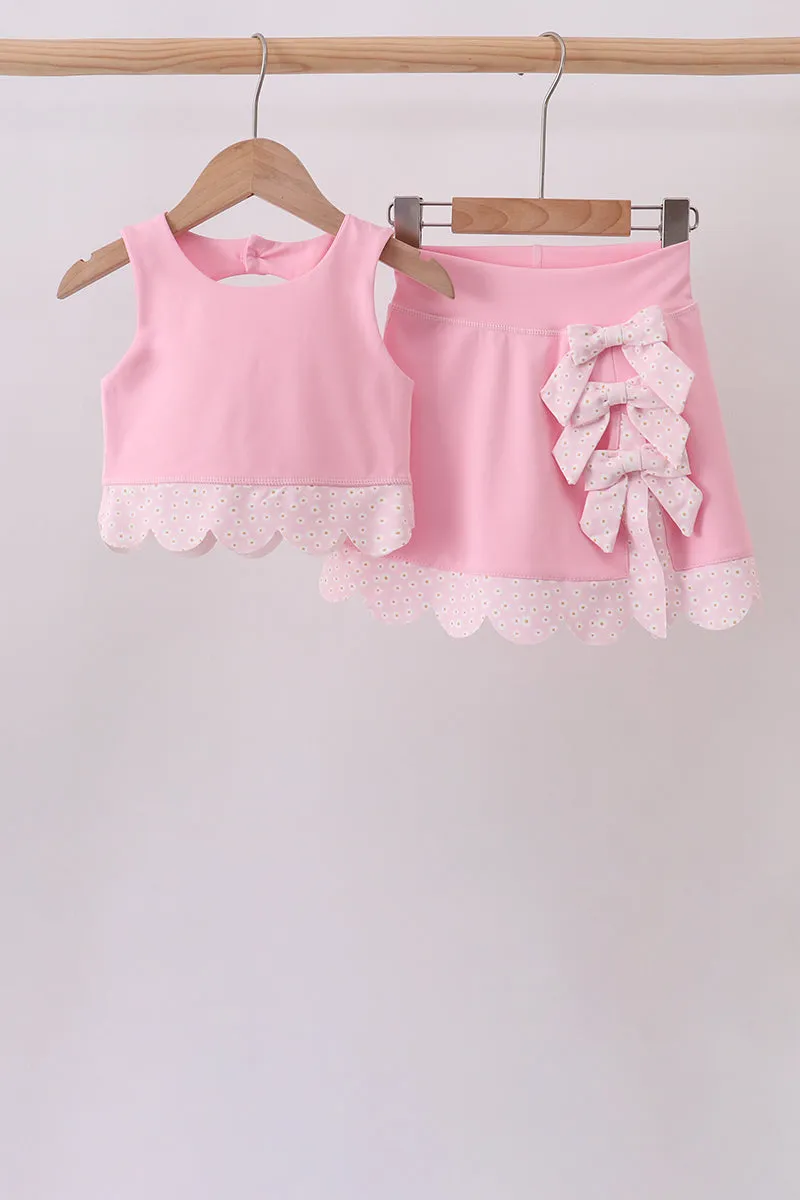 Pink scalloped active skorts set sold by Zulily