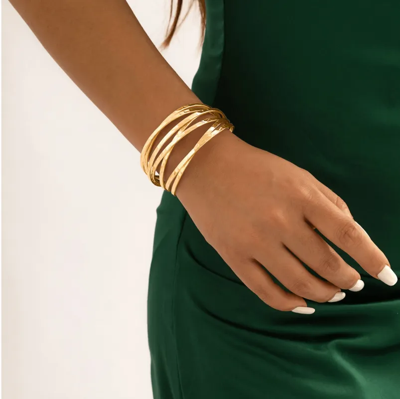 Don't AsK Goldtone Criss Cross Bangle Bracelet made by Zulily