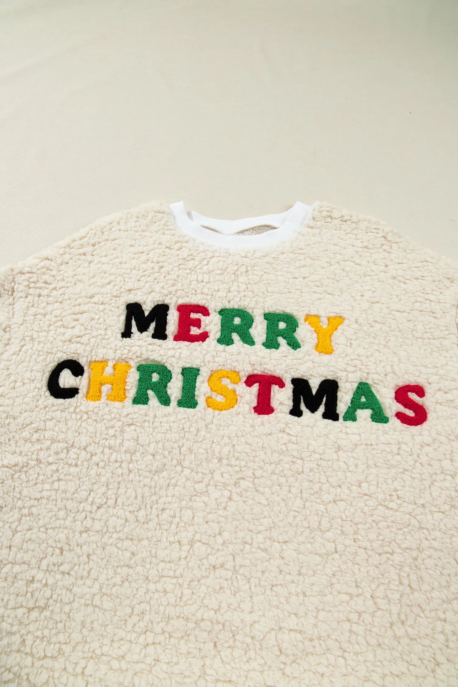 Threaded Pear Ensley Christmas Embroidered Sherpa Pullover sold by Zulily
