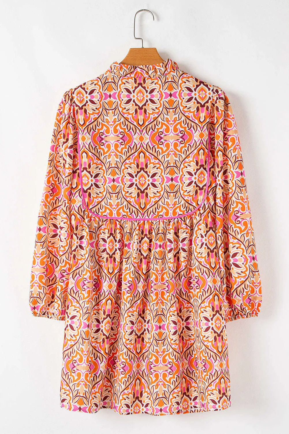 Threaded Pear Aisha Long Sleeve Tied Neckline Mini Dress sold by Zulily