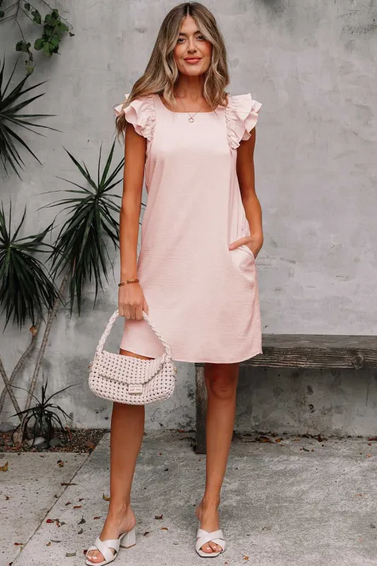 Threaded Pear Abigail Textured Flutter Sleeve Bow Back Mini Dress made by Threaded Pear