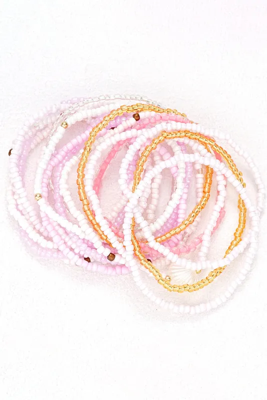 Threaded Pear Pink Bohemian Beaded Shell Ornament Bracelet Set made by Threaded Pear
