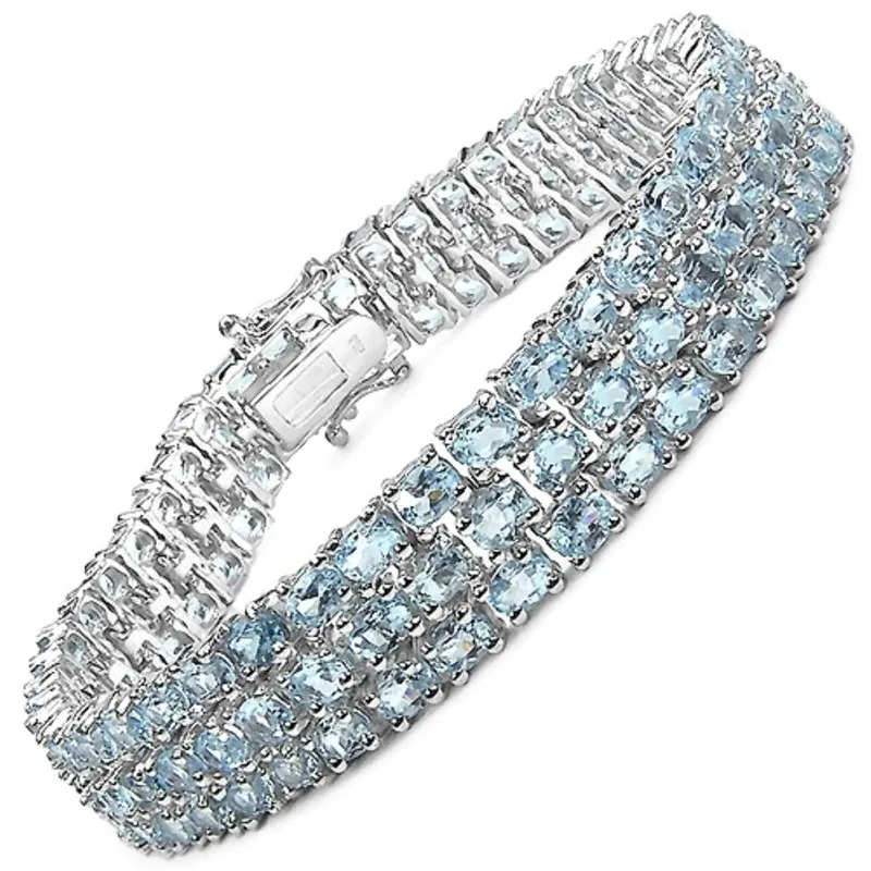26.20 Ct Oval Sky Blue Topaz Prong Sterling Silver Triple Row Tennis Bracelet made by Zulily