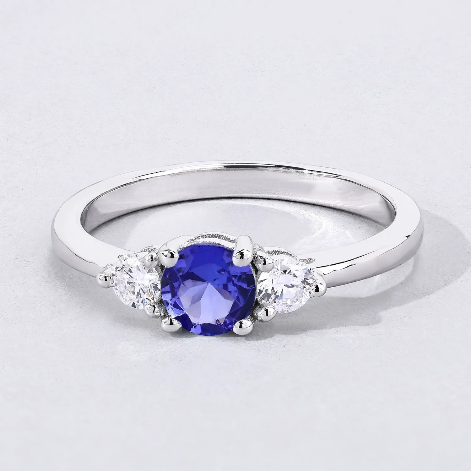 0.47 Ct Round Violet Tanzanite & Lab Diamond Prong Silver Three Stone Ring sold by Zulily product image thumbnail 4