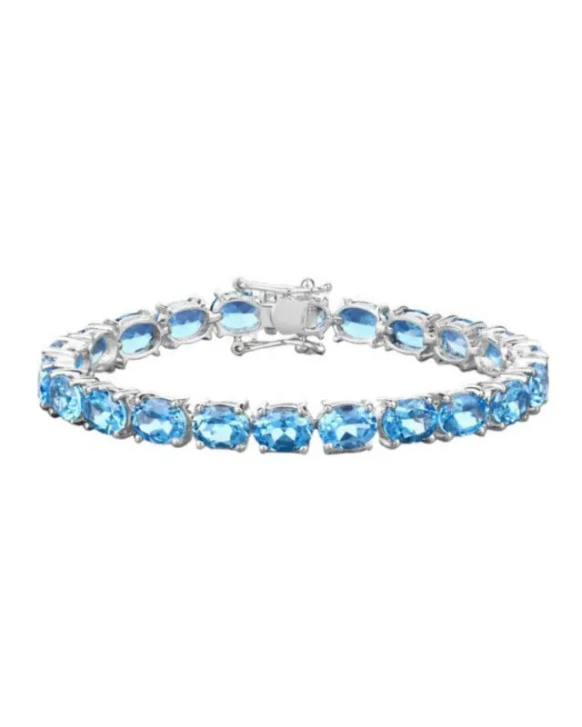 35.20 Ct Oval Swiss Blue Topaz Prong Sterling Silver Tennis Bracelet made by Zulily