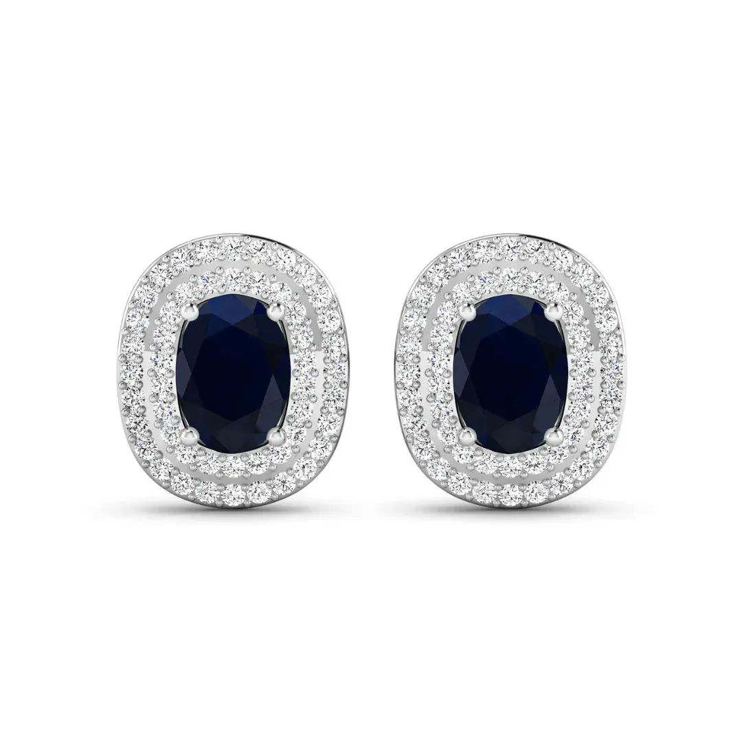 Genuine White Diamond and Blue Sapphire Studs sold by Zulily