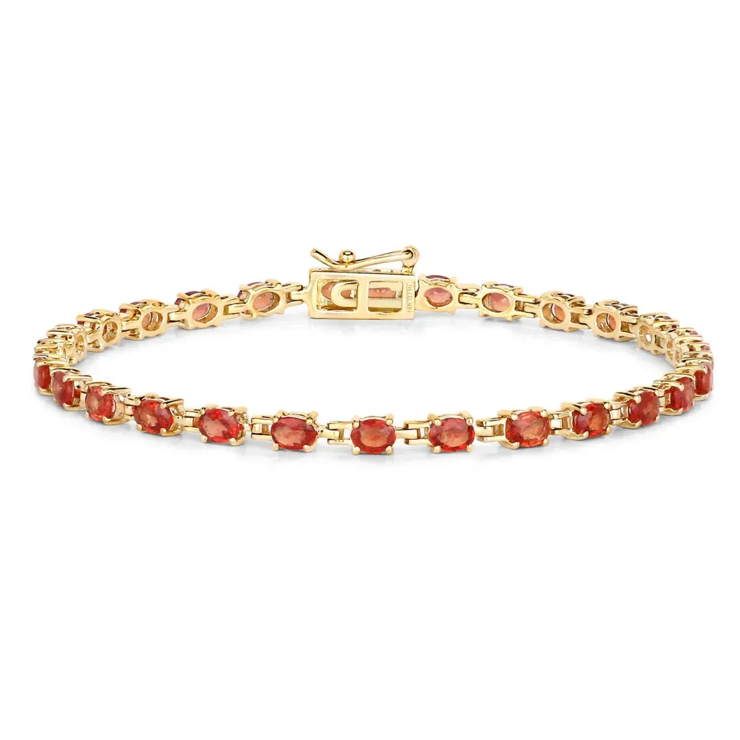 7.00 Ct Oval Orange Sapphire Prong 14K Yellow Gold Inline Tennis Bracelet sold by Zulily