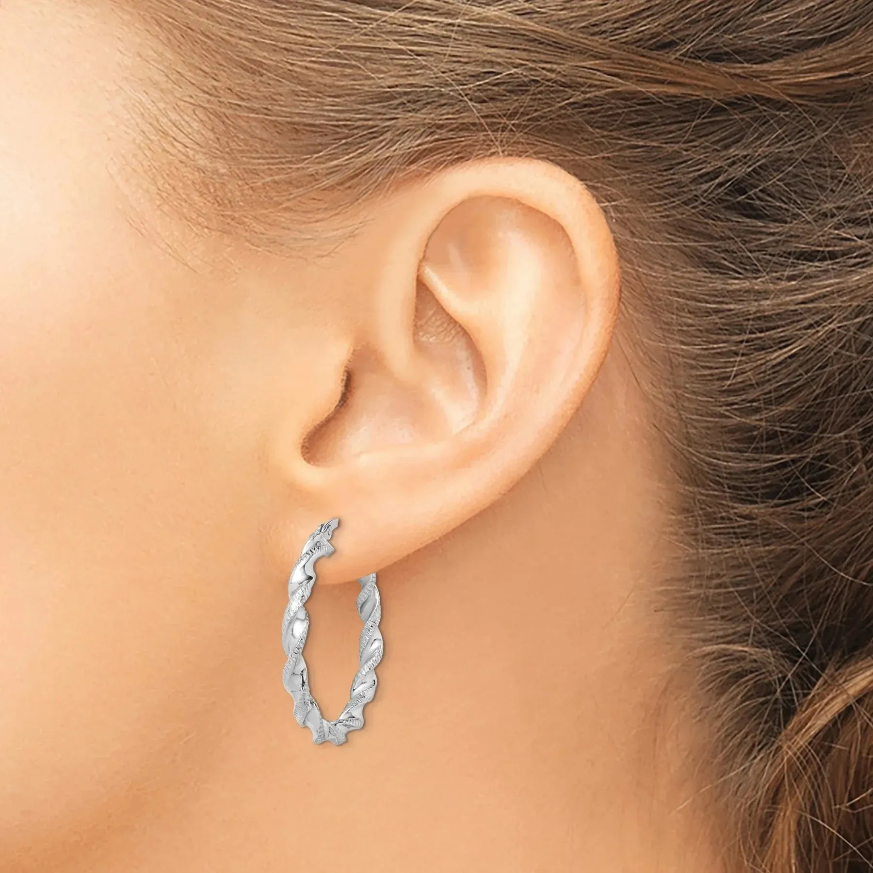 Twisted Silver Hoop Earrings sold by Zulily product image thumbnail 2
