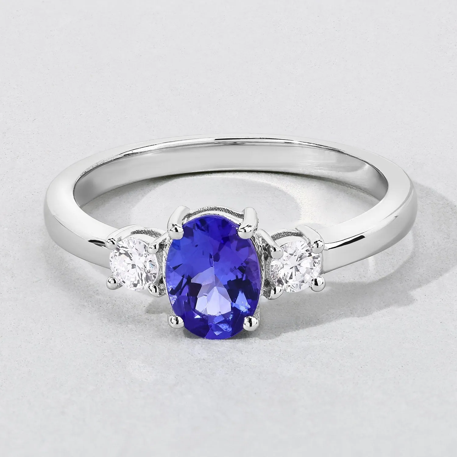 0.75 Ct Oval Violet Tanzanite and Lab Diamond Prong Silver Three Stone Ring sold by Zulily product image thumbnail 4