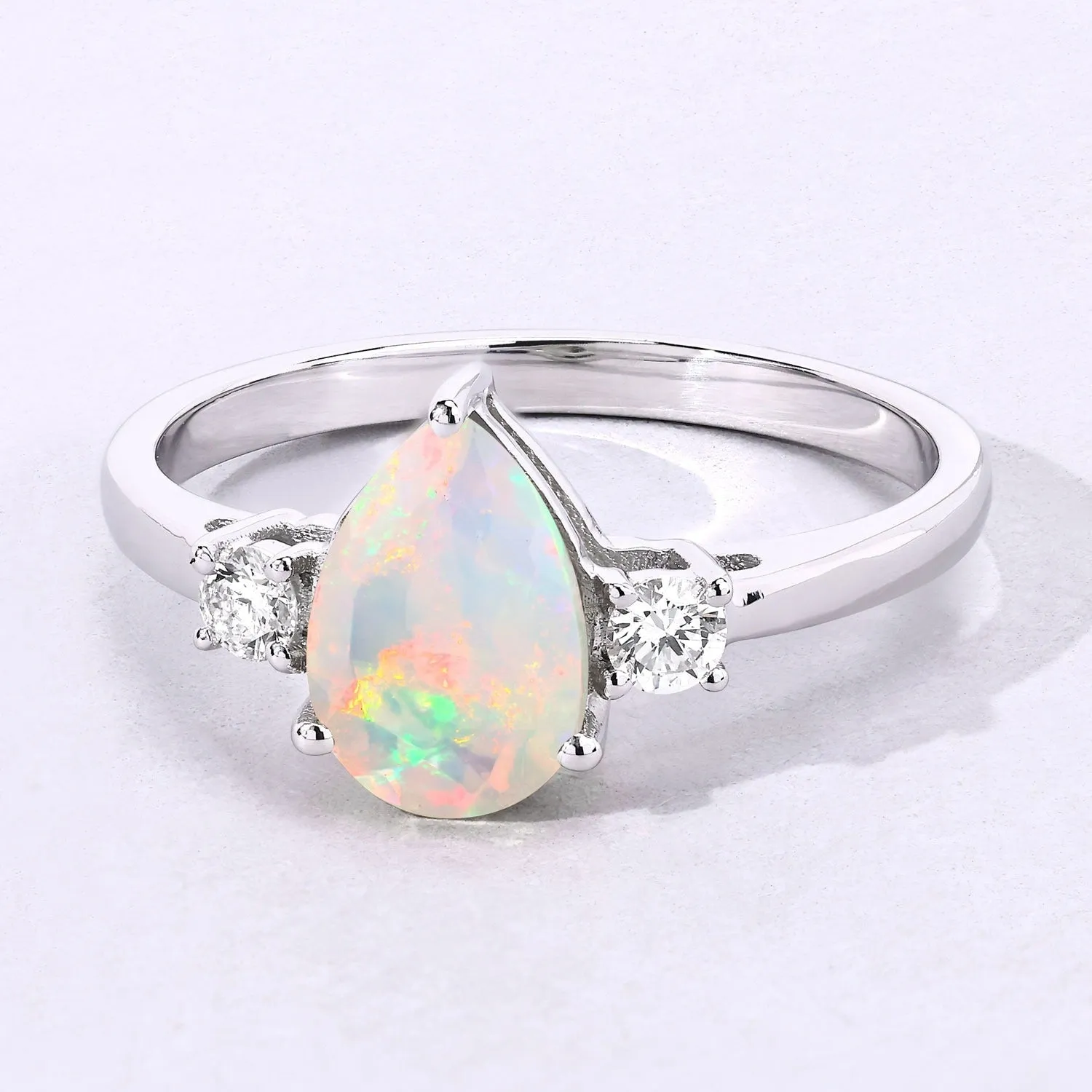 0.90 Ct Pear White Ethiopian Opal and Lab Diamond Prong Silver Three Stone Ring sold by Zulily product image thumbnail 5