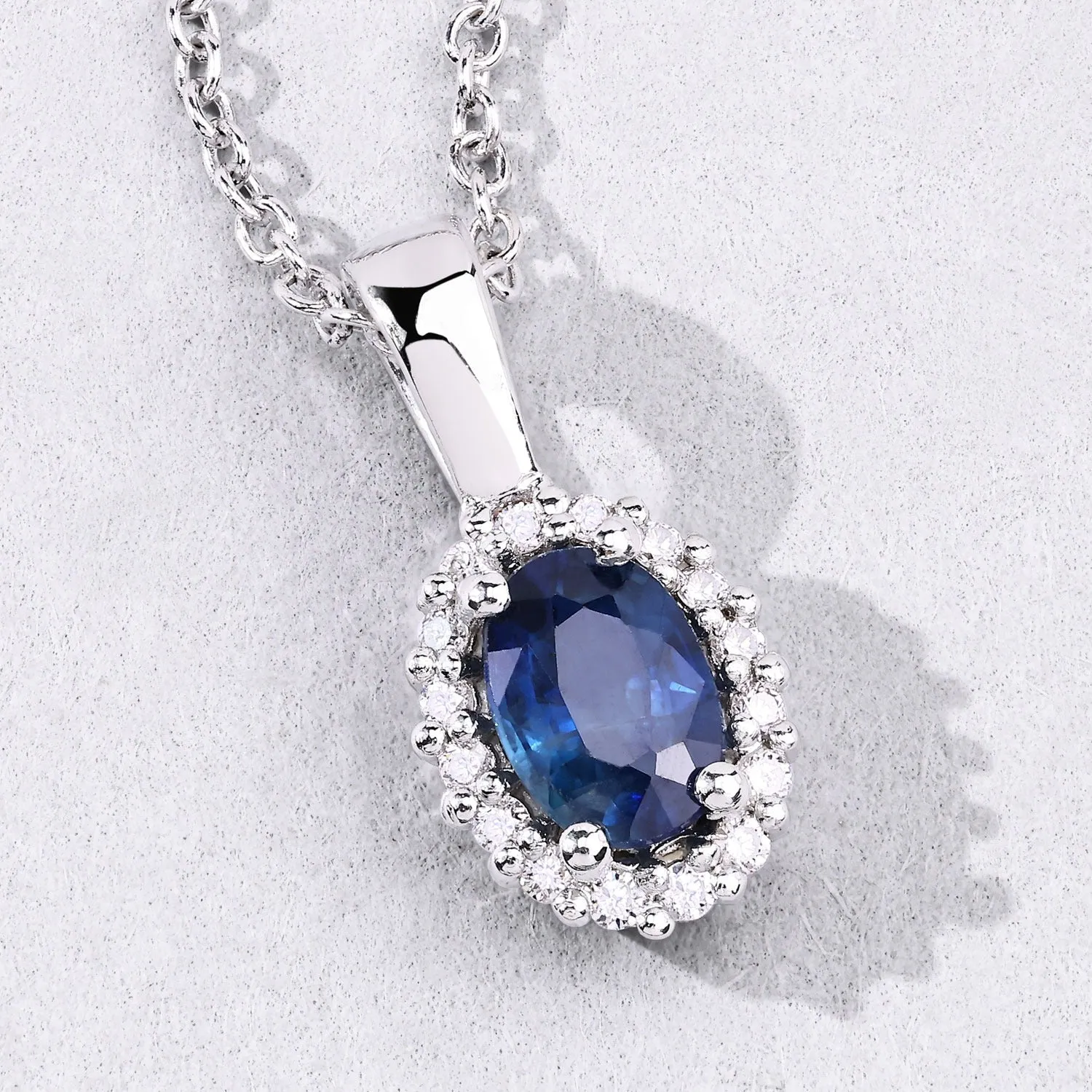 0.55 Ct oval Blue Sapphire and Lab Diamond prong Silver Halo pendant Necklace sold by Zulily product image thumbnail 5