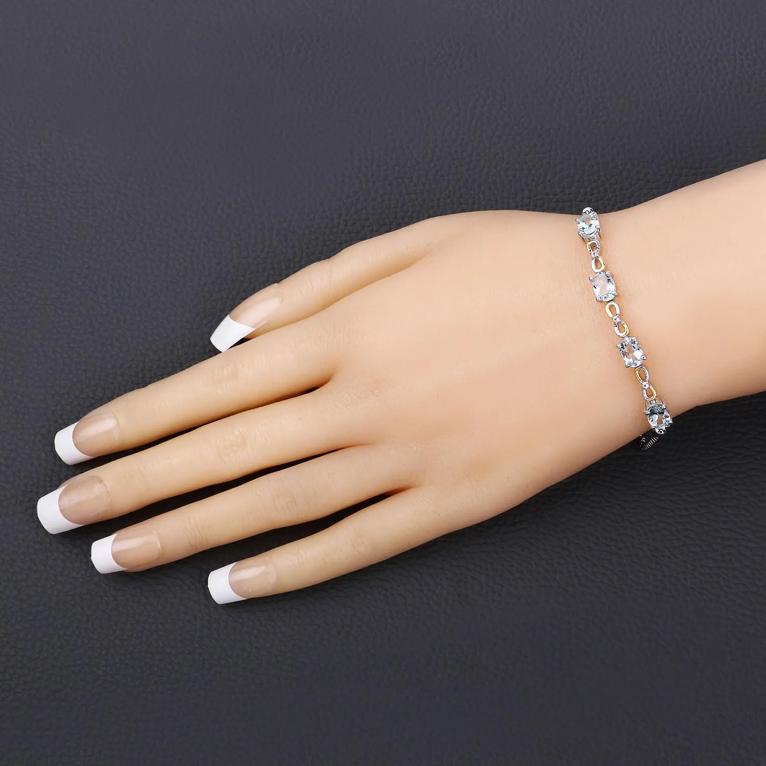 Oval Blue Aquamarine Prong Two-Tone Gold Plated Silver Infinity Bolo Adjustable Bracelet sold by Zulily product image thumbnail 2