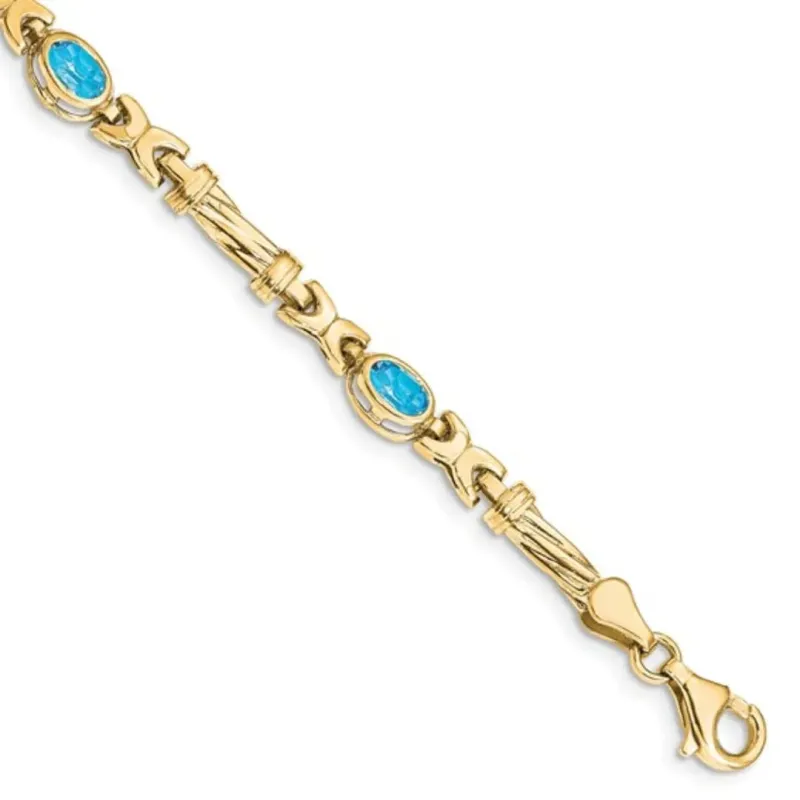 Oval Swiss Blue Topaz Bezel 10K Yellow Gold Fancy Link Bracelet made by Zulily
