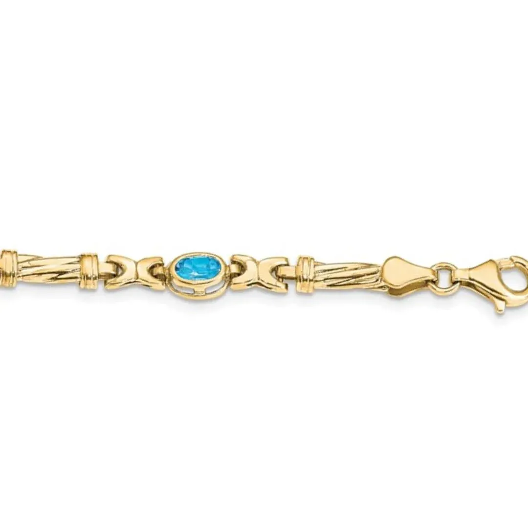 Oval Swiss Blue Topaz Bezel 10K Yellow Gold Fancy Link Bracelet sold by Zulily product image thumbnail 2