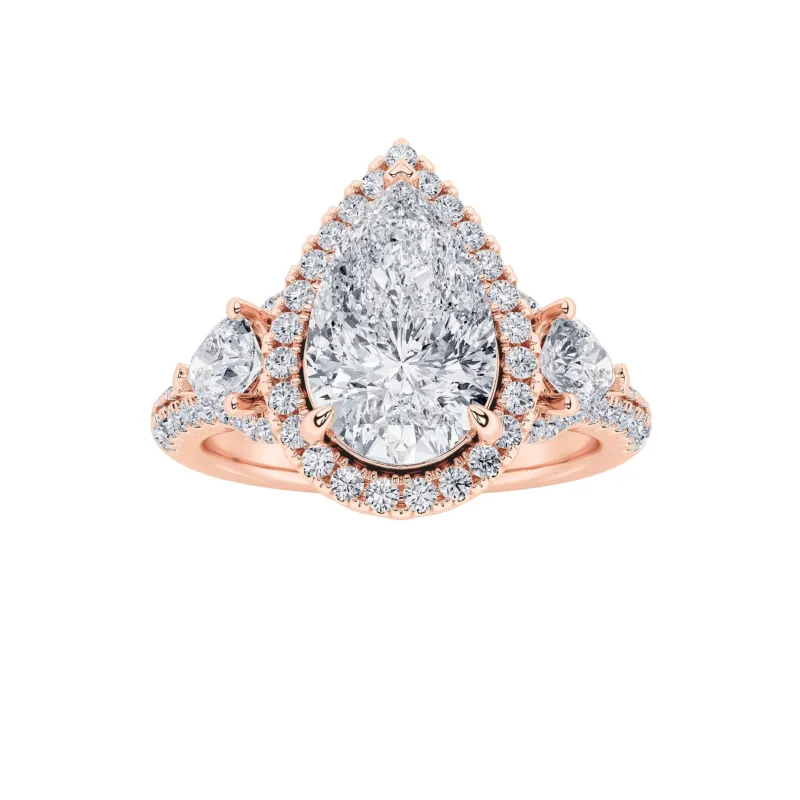 3Cttw Pear Shaped Lab Grown Diamond (F/VS) Three Stone Bold Accented Engagement Ring in 14K Gold made by Zulily