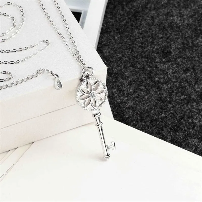 Cubic Zirconia & Silvertone Floral Key Pendant Necklace made by Zulily