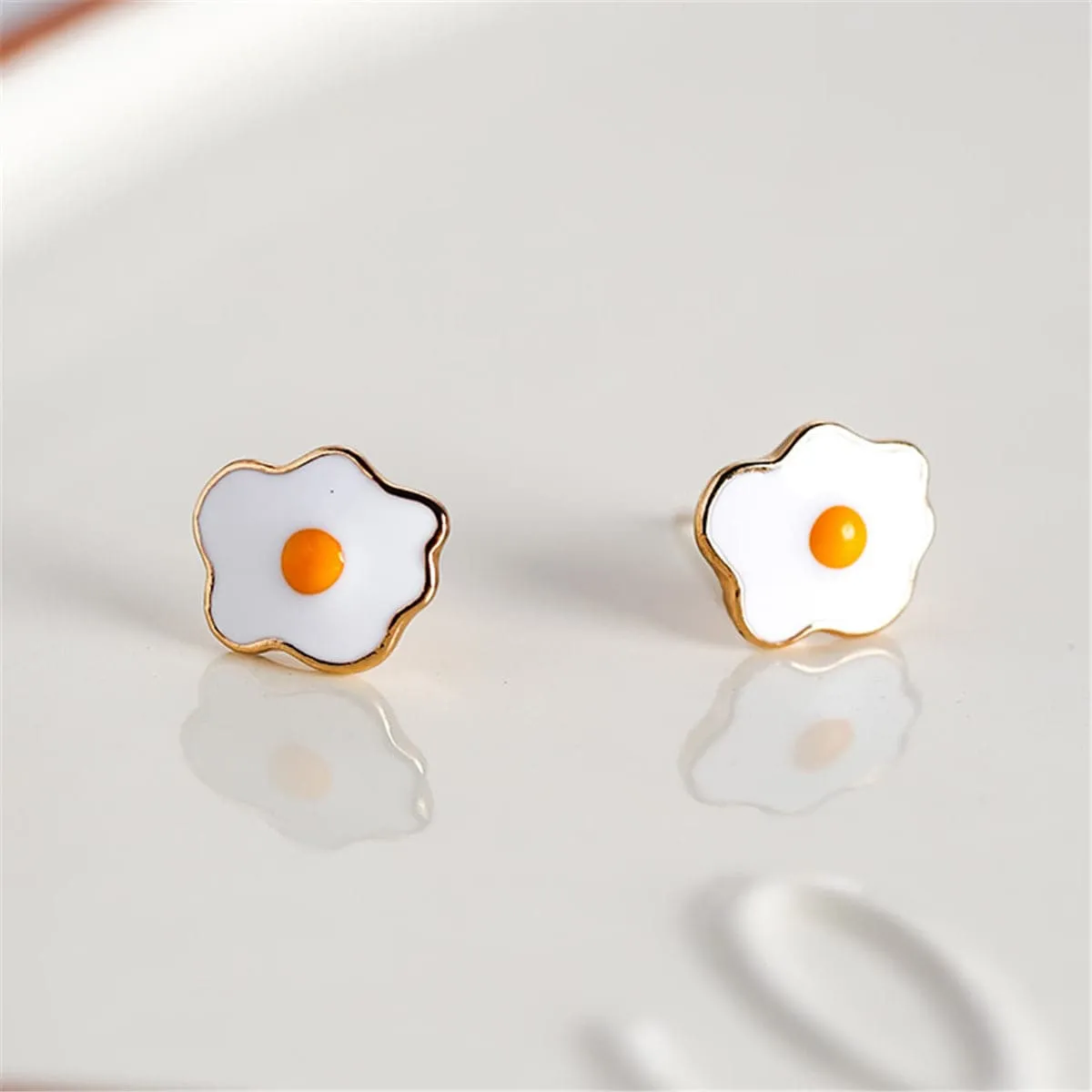 White Enamel & Goldtone Poached Eggs Stud Earrings sold by Zulily