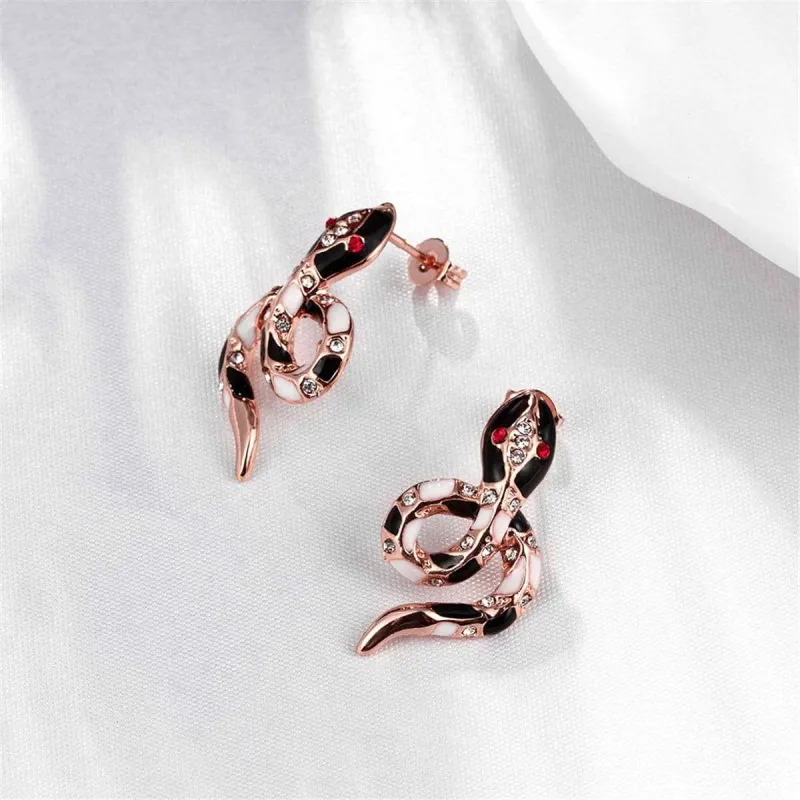 Cubic Zirconia & Enamel Rose Goldtone Snake Stud Earrings made by Zulily