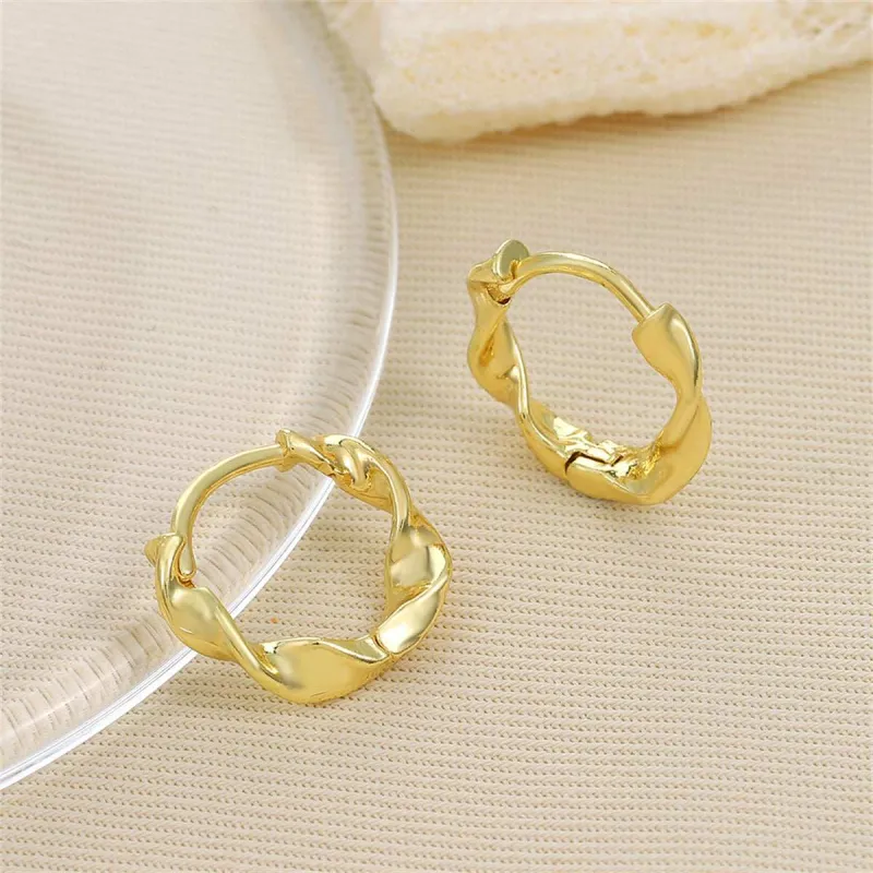 Goldtone Twine Huggie Earrings made by Zulily