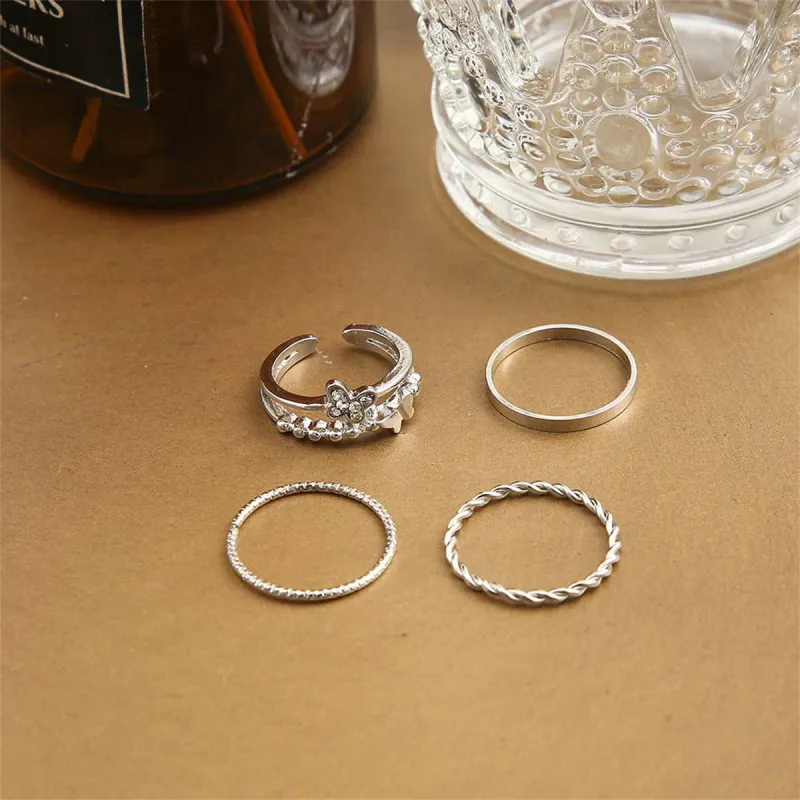 Cubic Zirconia & Silvertone Openwork Butterfly Twine Ring Set made by Zulily