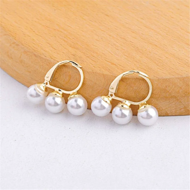 Pearl & Goldtone Triple Stud Earrings made by Zulily