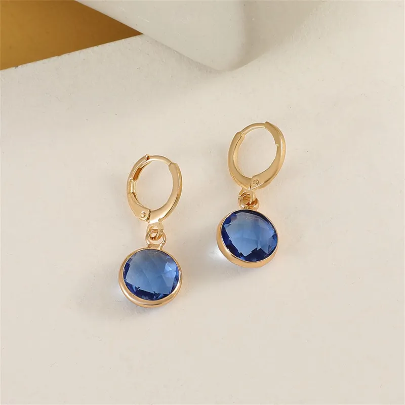 Blue Crystal & Goldtone Round Huggie Earrings made by Zulily
