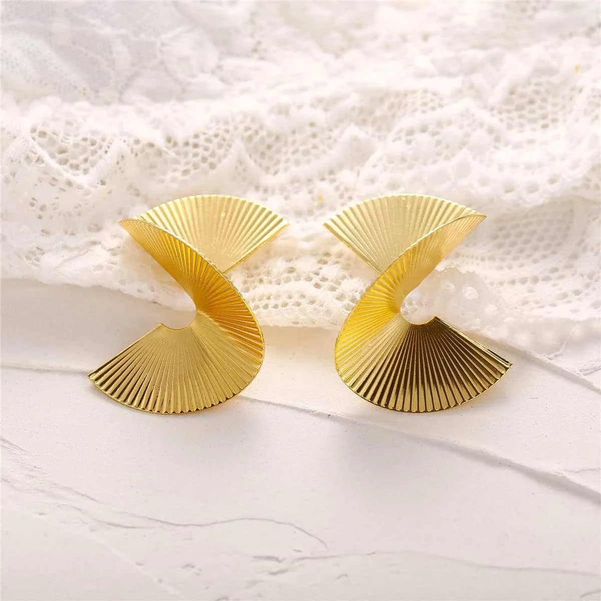 Goldtone Spiral Stud Earring sold by Zulily
