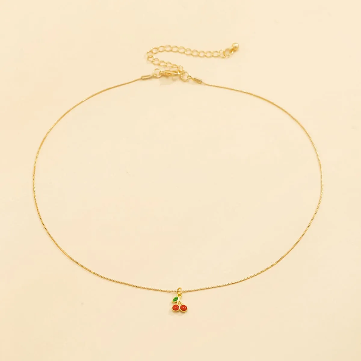Red Enamel & Goldtone Cherry Pendant Necklace sold by Zulily product image thumbnail 2