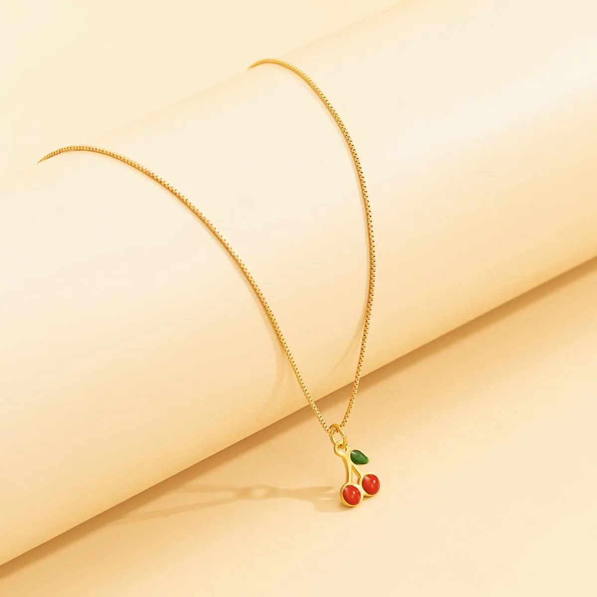 Red Enamel & Goldtone Cherry Pendant Necklace sold by Zulily