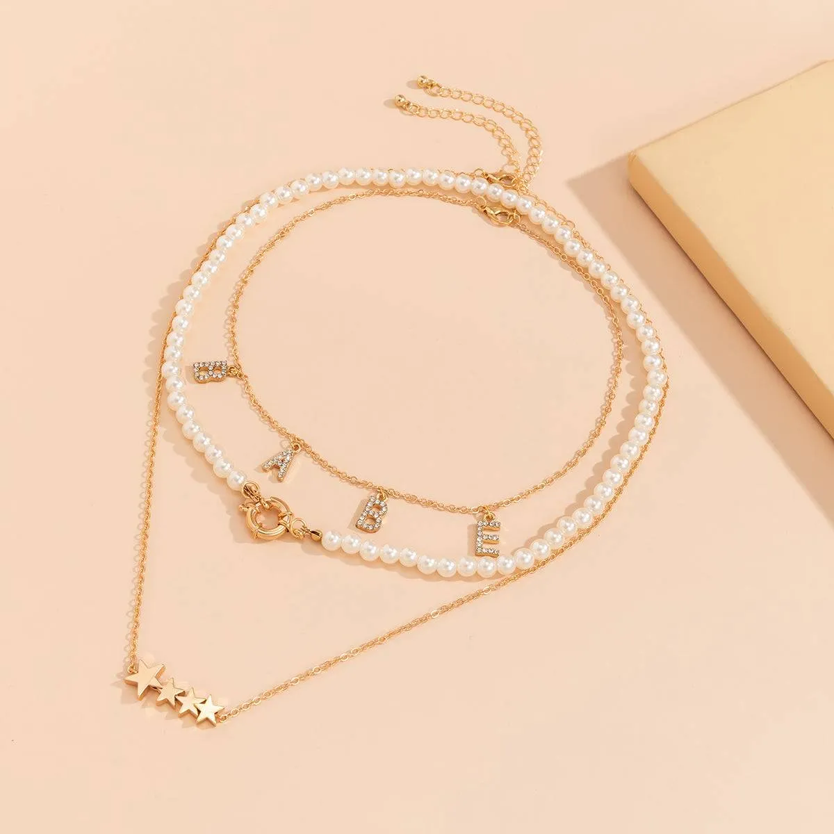 Pearl & Cubic Zirconia Goldtone 'Babe' Star Necklace Set sold by Zulily product image thumbnail 2