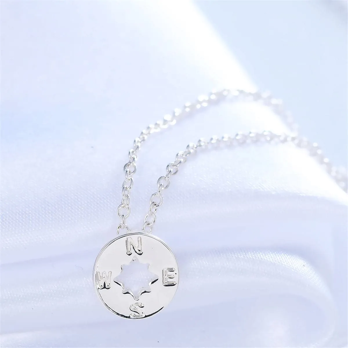 Silvertone Open Compass Pendant Necklace sold by Zulily