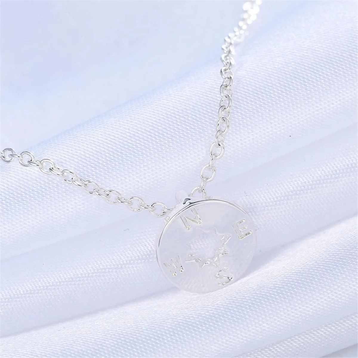 Silvertone Open Compass Pendant Necklace sold by Zulily product image thumbnail 2