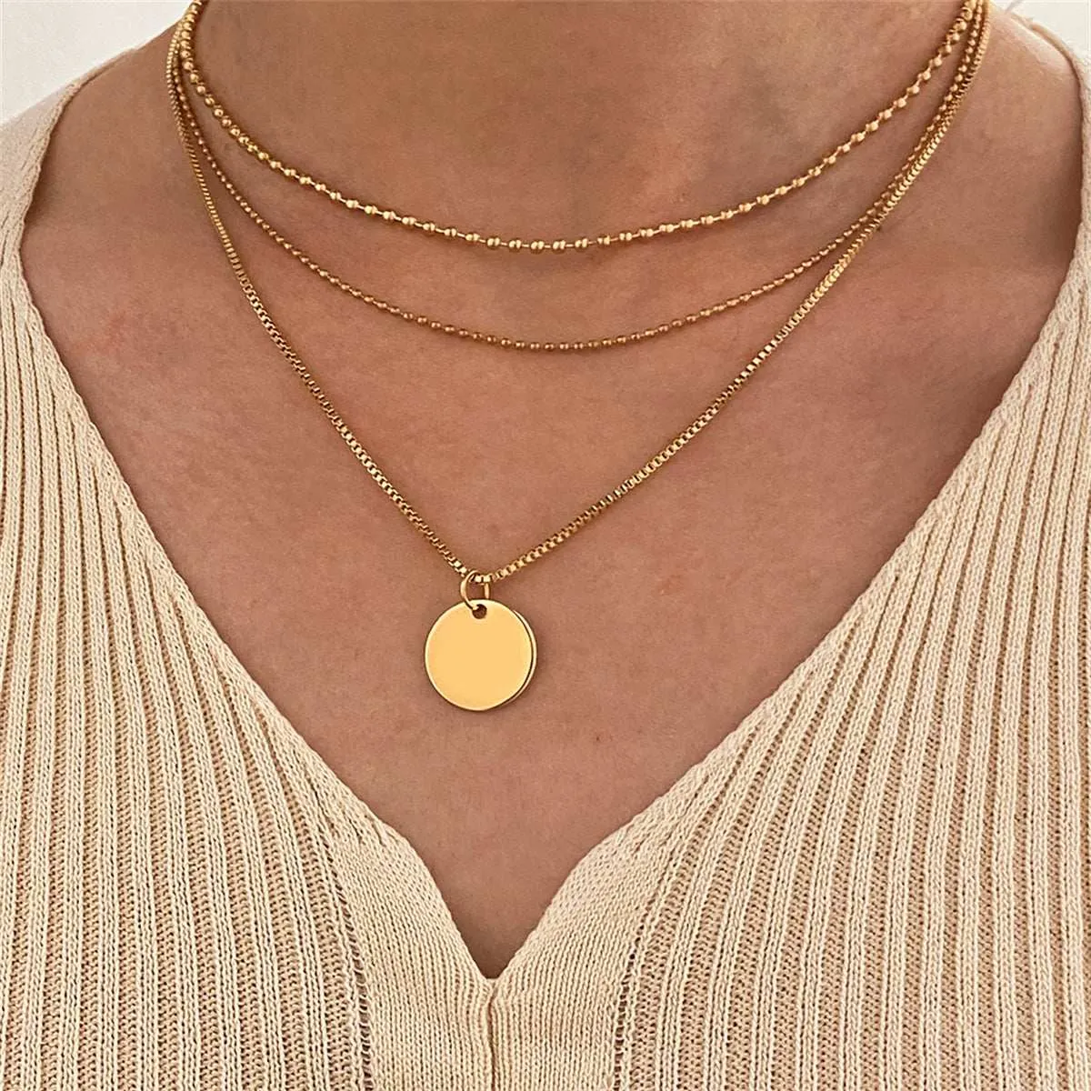 Goldtone Circle Layered Pendant Necklace sold by Zulily