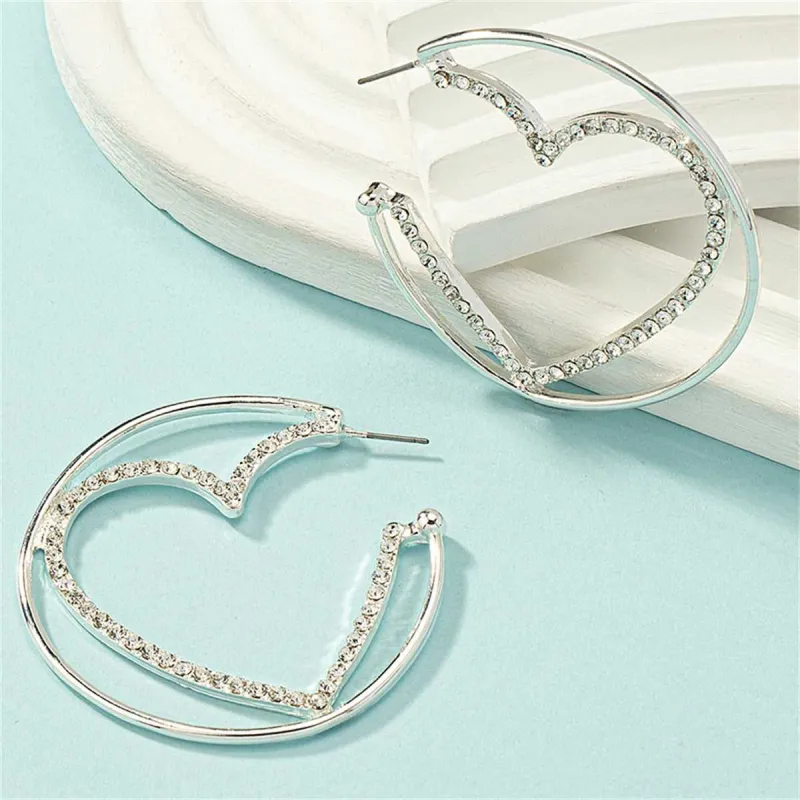 Cubic Zirconia & Silvertone Heart Huggie Earrings made by Zulily