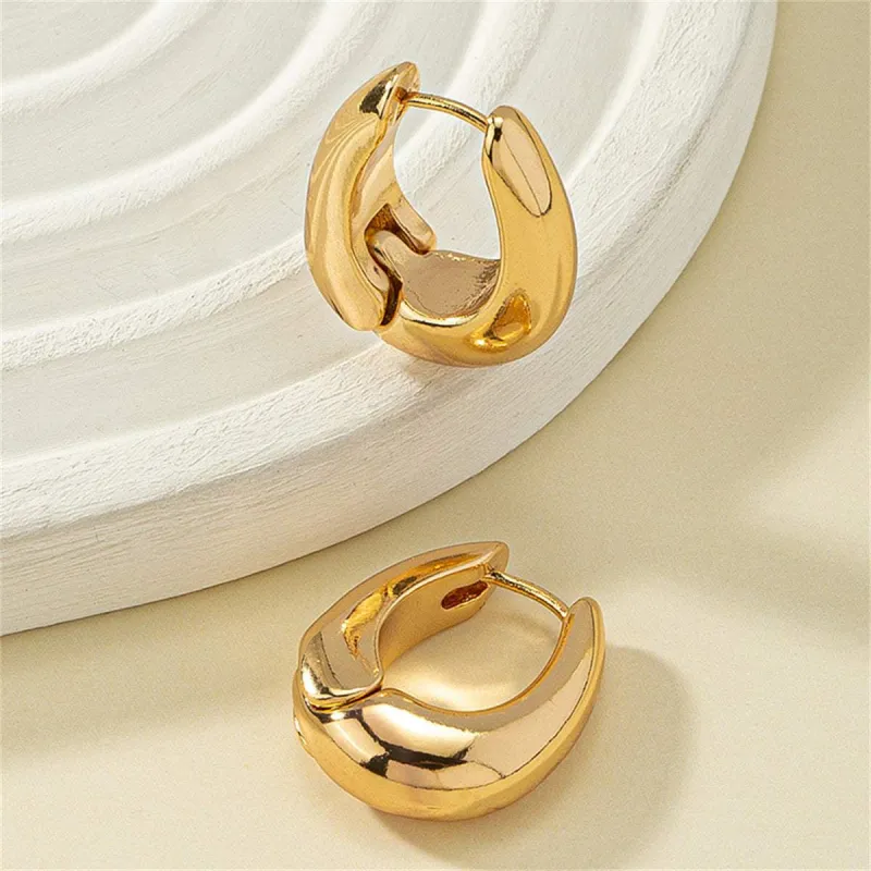 Goldtone U-Shape Huggie Earrings made by Zulily