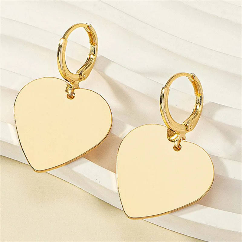 Goldtone Heart Huggie Earrings made by Zulily
